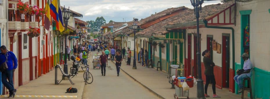 The heart of Eje Cafetero, Salento's iconic wax palms and colorful streets make it a must-see destination.