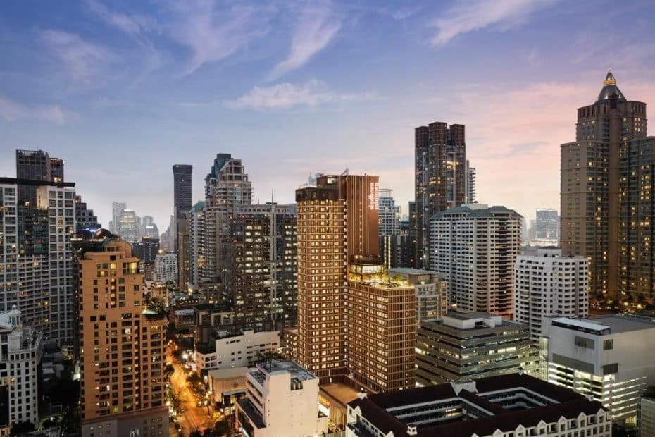 Siam, Bangkok's shopping hub, offers mega-malls, trendy boutiques, the Art Center, and access to the BTS Skytrain network.