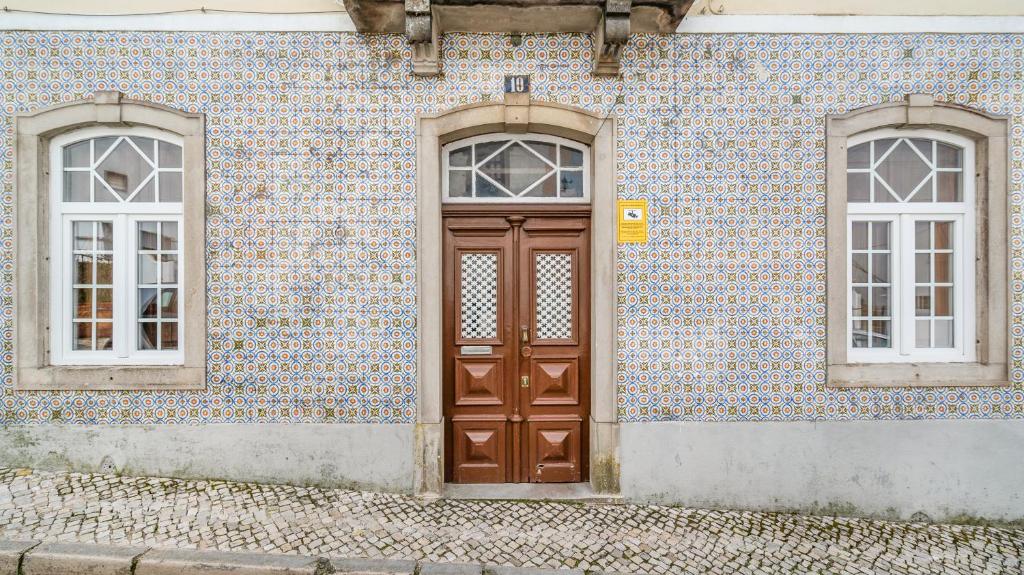 Some of the houses around the Olga Cadaval Cultural Center feature Portuguese tiles