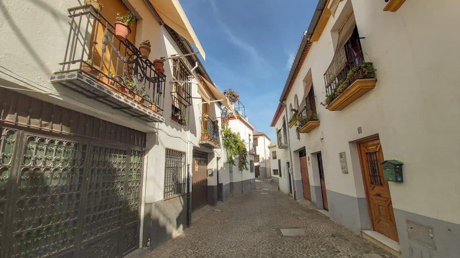 Albaicín is a historic neighborhood known for its narrow streets and white-washed houses. It offers stunning views of the Alhambra and a traditional Andalusian experience