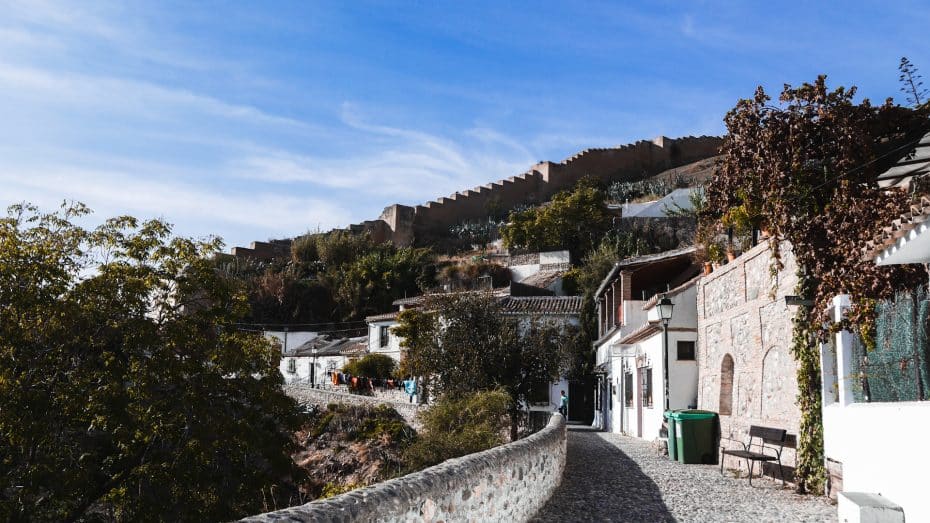 Famous for its cave houses and flamenco shows, staying in Sacromonte provides a unique cultural experience with beautiful views and a bohemian vibe