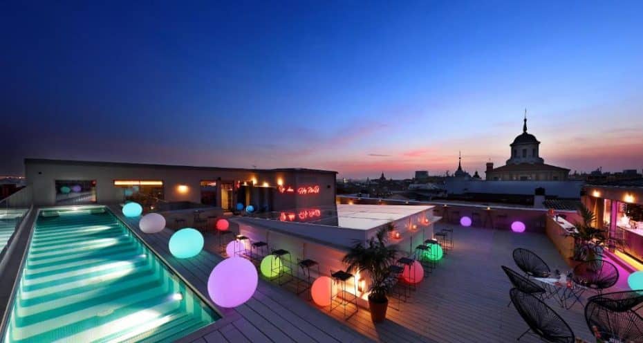 Axel Hotel's rooftop and bar at sunset