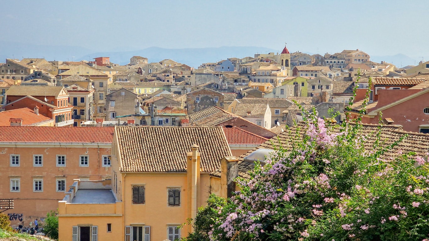 The Old Town in Corfu Town is the best area to stay due to its charming narrow streets, historic architecture, vibrant markets, and close proximity to major attractions