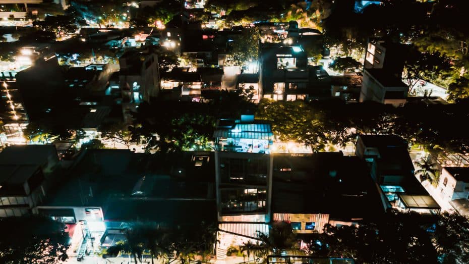 El Poblado, specifically the areas of Calle 10, Parque Lleras, Manila, and Provenza, are the top nightlife districts in Medellín.