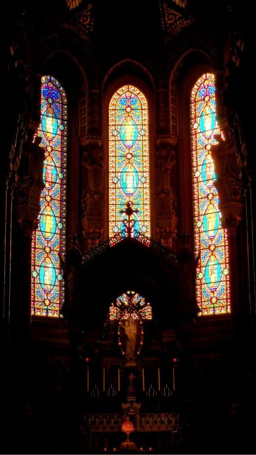 High altar and stained glass windows of Notre Dame de Fourvière